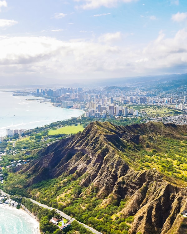 Aerial view of Diamond Head crater with Waikiki and Honolulu in the background